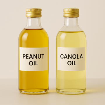 peanut oil vs canola oil what is healthier two bottles of oil and theyre next to eachother